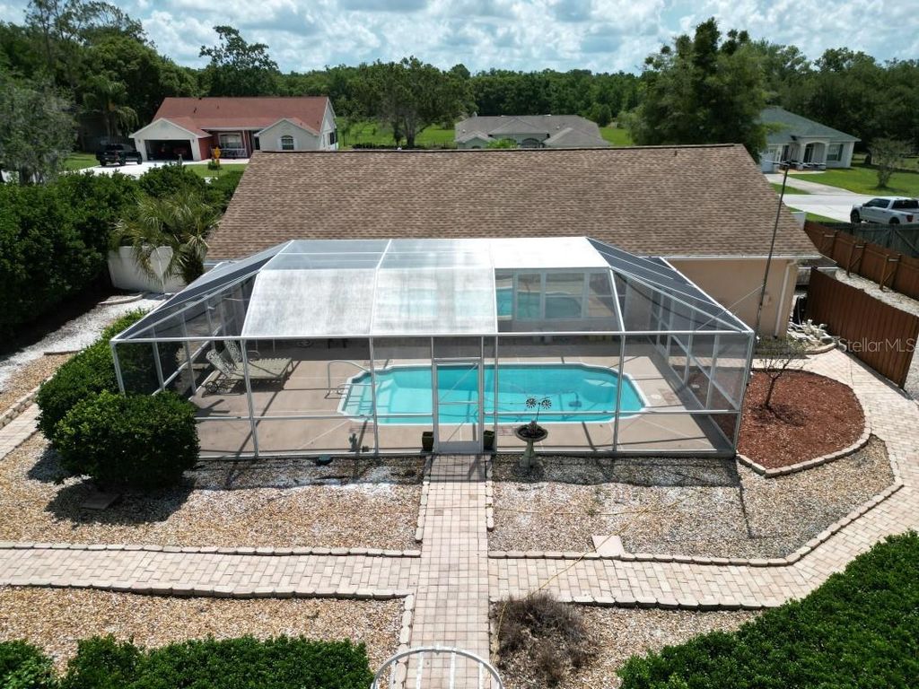 Photo of 12125 Knotty Pine Loop, San Antonio, FL 33576 (MLS # TB8509654)