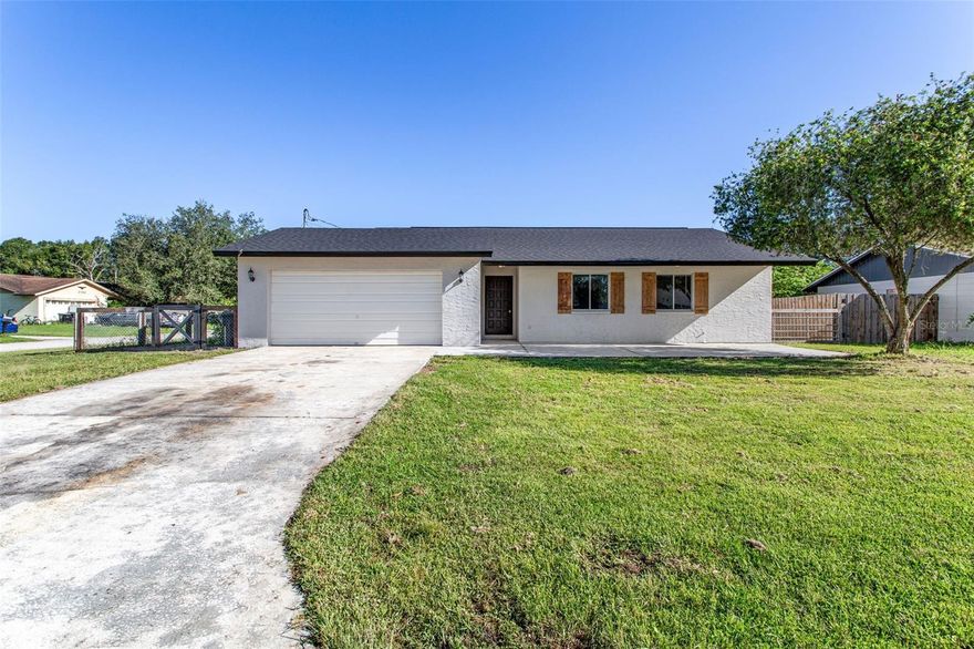 Discover the perfect blend of comfort and convenience in this spacious 3-bedroom, 2-bathroom home nestled in a charming neighborhood. This gem boasts an additional detached 2-car garage and is strategically located near I4 for effortless commuting. No more HOA fees to worry about! The generously sized corner lot comes with a fully fenced backyard, offering ample space for outdoor fun and relaxation. Step inside to find open living areas that are ideal for both entertaining and dining. The master bedroom, complete with an en suite, is spacious and conveniently positioned adjacent to the formal living space. Embrace the outdoors through sliding glass doors leading to a delightful screened porch, your own private oasis. Noteworthy is the detached garage featuring an insulated AC-cooled room, ripe for transformation into the ultimate Man Cave or She Shed. Both the main house and detached garage flaunt brand-new roofs, each carrying warranties for your peace of mind. This property is a fantastic choice for families seeking a move-in ready home or savvy investors exploring cash flow opportunities. Experience relaxation near the sprawling Lake Parker, delve into downtown Lakeland's charm, or catch the Detroit Tigers' spring training at Publix Field in Joker Marchant Stadium, all conveniently close. Don't miss out on this captivating opportunity to own your dream abode!