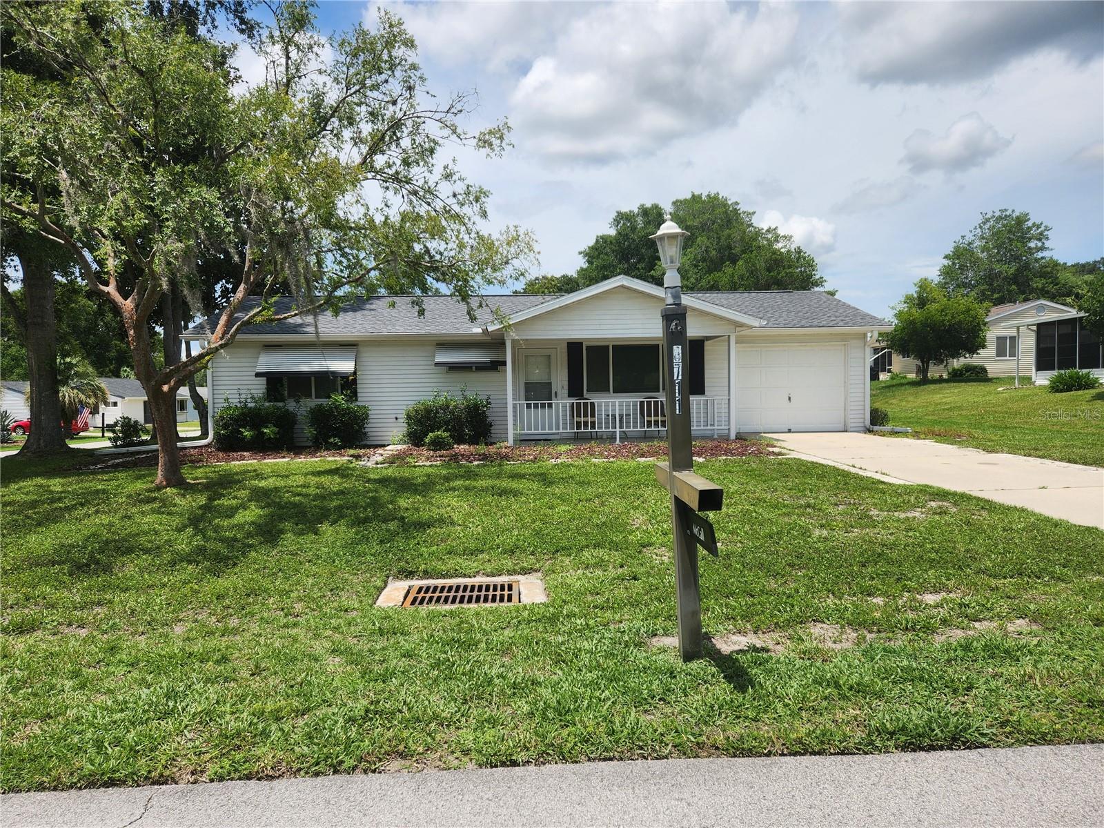 Cozy 2 bedroom 1 bath home in 55+ community. Currently furnished but owner willing to remove furniture for long term rental. Home is closely located to pool, fitness center, tennis courts, hot tubs, library, craft room, card room, horseshoes, bocce ball and shuffleboard courts. Nice front porch and huge covered back patio. Lawn care included. Community also offers a Golf Course, Restaurant, lots of clubs and more pools and hot tubs, another fitness center, BINGO and more. Located right outside the gate is WalMart, shopping, restaurants, and medical facillities.