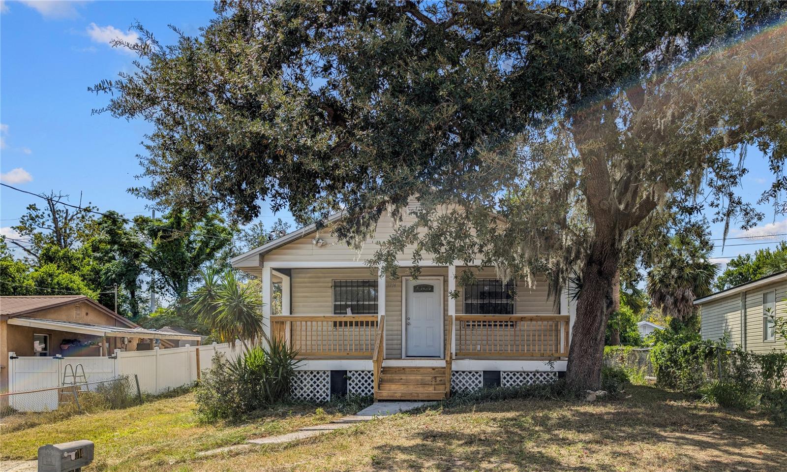 Discover Your Tampa Haven – Where Comfort Meets Opportunity! Step into this charming single-story home where everyday living feels effortless and possibilities unfold naturally. Built in 1996 and recently renovated, this 3-bedroom, 2-bathroom residence offers over 1,050 square feet of move-in-ready living space, perfect for embracing your personal style. From the moment you arrive, you'll appreciate the inviting covered front porch—the perfect spot for morning coffee, evening conversations with neighbors, or simply watching the world go by. It's that classic Florida touch that makes a house feel like home. Inside, every detail has been thoughtfully updated for modern living. Fresh paint throughout creates a bright, welcoming atmosphere, while stylish vinyl plank flooring flows seamlessly from room to room—beautiful, durable, and ideal for Florida's climate. The kitchen features elegant granite countertops that blend style with practicality, and both bathrooms have been completely renovated with stunning marble-look tile and contemporary fixtures that feel like a daily retreat. One standout feature is the brand-new roof installed in March 2025, offering peace of mind and long-term savings. Step outside to discover your private patio canvas. Whether you envision weekend barbecues under string lights, a vegetable garden, or a play area, this generous lot gives you the space to make it happen. Located in the heart of Tampa’s growing landscape, you’re never far from what matters most. Educational options and childcare facilities serve the community, while shopping and dining cater to every taste and budget. The single-story design makes daily living effortless—no stairs to navigate with groceries, laundry, or as you settle into your golden years. Major roadways connect you easily to Tampa’s vibrant downtown, beautiful beaches, and employment centers. This home speaks to the dreamer in every first-time buyer ready to plant roots, and to the savvy investor who recognizes Tampa’s continued growth potential. Ready to see yourself here? Your private tour awaits.