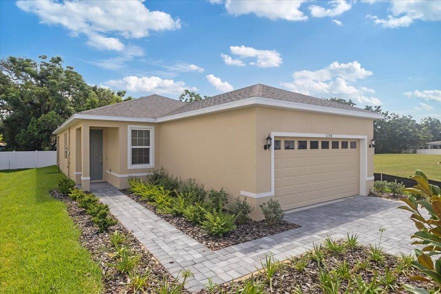 New floorplan! Welcome to the Delight, a spacious open plan with 3 bedrooms and 2 bathrooms. Key features include 9’4” ceilings, 17" x 17" ceramic tile that flows throughout all living areas and a sliding glass door welcoming you to a lanai. The kitchen features ample cabinetry with 42” upper cabinets for extra storage, a spacious island with sink and quartz countertops. Stainless steel appliances include a microwave over the range, dishwasher and side by side refrigerator. Retreat to the private master suite featuring dual vanities and a large walk-in closet. Every home comes with blinds on the windows and a SMART home technology package. The Delight stands out with its forward-thinking design as the home can grow with you.