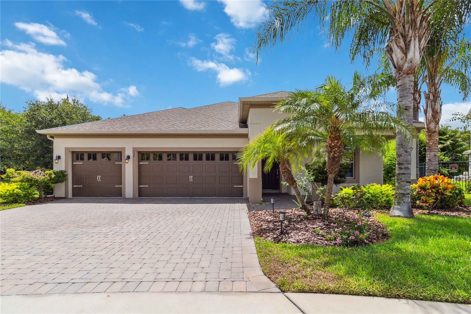 Welcome to this move in ready 4-bedroom, 3-bath, 3-car garage pool home located in the exclusive gated community of Eden Point, a desirable Winter Park address! From the moment you arrive, you'll be impressed by the gorgeous elevation, paver driveway, and inviting front porch. This home offers a thoughtful split floor plan, tray ceilings, and rich Bamboo floors, creating a sense of space and elegance throughout. The gourmet kitchen is a chef’s dream—featuring 42” upper cabinets with crown molding, granite countertops, tile backsplash, stainless steel appliances, a center island, breakfast bar, and a spacious walk-in pantry. The kitchen opens seamlessly to the breakfast nook, and family room. Step outside to the covered lanai and enjoy your pool—perfect for relaxing or entertaining. The primary suite is a peaceful retreat with a tray ceiling, dual walk-in closets, garden tub, glass shower, and double vanity. Three additional spacious bedrooms with large closets are located off a private hallway. Eden Point is an intimate, gated community just minutes from 417, with easy access to top-rated public and private schools, fine dining, boutique shopping, and vibrant entertainment options. A MUST SEE! Call today for your private showing.