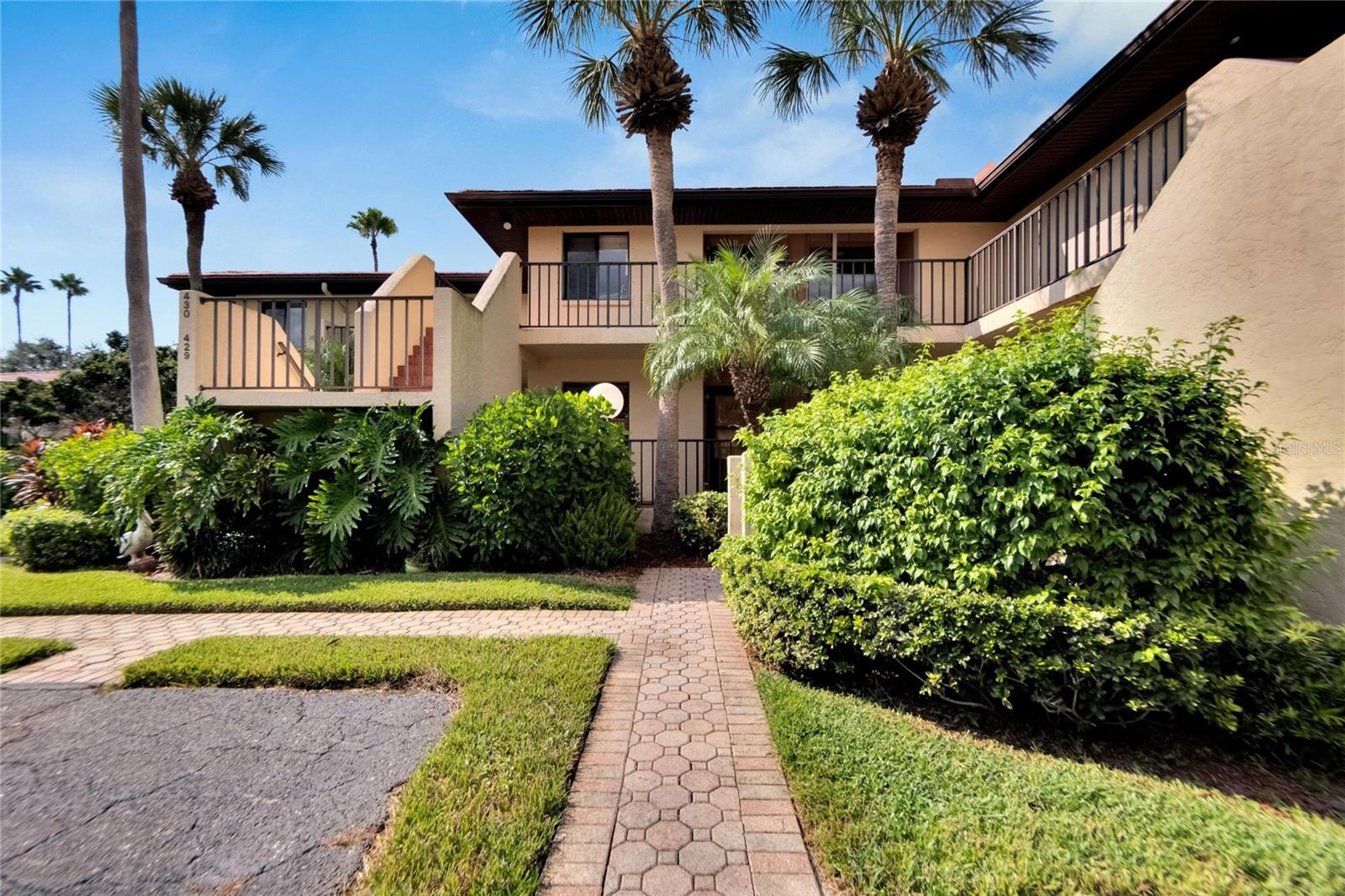 Welcome to the lush, tropical, pet-friendly community of Wild Oak Bay. Situated along the north shore of Sarasota Bay. This 2 bedroom, 2 bathroom first floor condo offers a beautiful oasis among mature Oak trees, botanical grounds and bird watching galore. Enjoy brand new stainless steel appliances. The Refrigerator, Range, Dishwasher & Water Heater were all upgraded in 2024. Whether you are looking for a full time santuary or a seasonal getaway this condo will suit your needs. The community restricts short term rentals so there is little turnover. This beautiful community is tucked away from it all and yet so close to IMG, Sarasota & the Gulf beaches of Anna Maria Island & Longboat Key. Welcome home.
