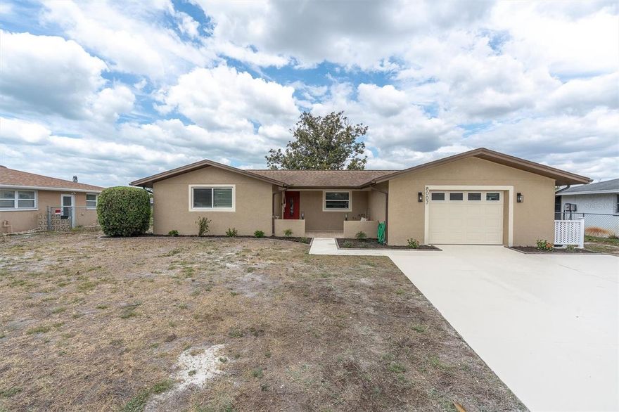 Searching for that new construction feel without that new construction cost?  Your search is over = with this fantastic ranch home fresh off renovate and update!  Florida is HOT and so is this PASCO MARKET! Come see what you can get in Jasmine Lakes!  This lovely 4 bedroom 2 bathroom home is located in the heart of the community, in the coastal town of Port Richey. The 4th bedroom can easily be transformed into an office with lake views or flex space; however, it currently offers a master closet buildout that renders it perfect for the space you see fit.  The bathrooms have been updated with bougie finishes and fabulous marbles.  The home has beautiful new baseboards, shiplap, vinyl floors, interior/exterior paint, new appliances, and garage organizer for laundry area, and the large mounted living room television conveys with the home.  The home's exterior hosts three patio areas with connecting walkway across back patios.  A hammock swings in front of the private lake views, under a gorgeous mature Magnolia tree.  A newly painted driveway and exterior walkway around the home that lead up to the beautiful front patio area for great entertaining space. When you step inside you will be transported from what you thought was a "House" to your luxury getaway.