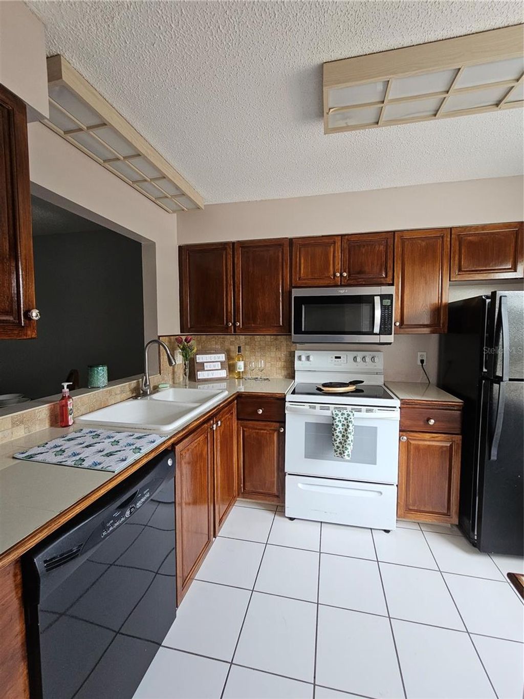 Photo of 13813 Mission Oaks Boulevard, Seminole, FL 33776 (MLS # TB8372105)