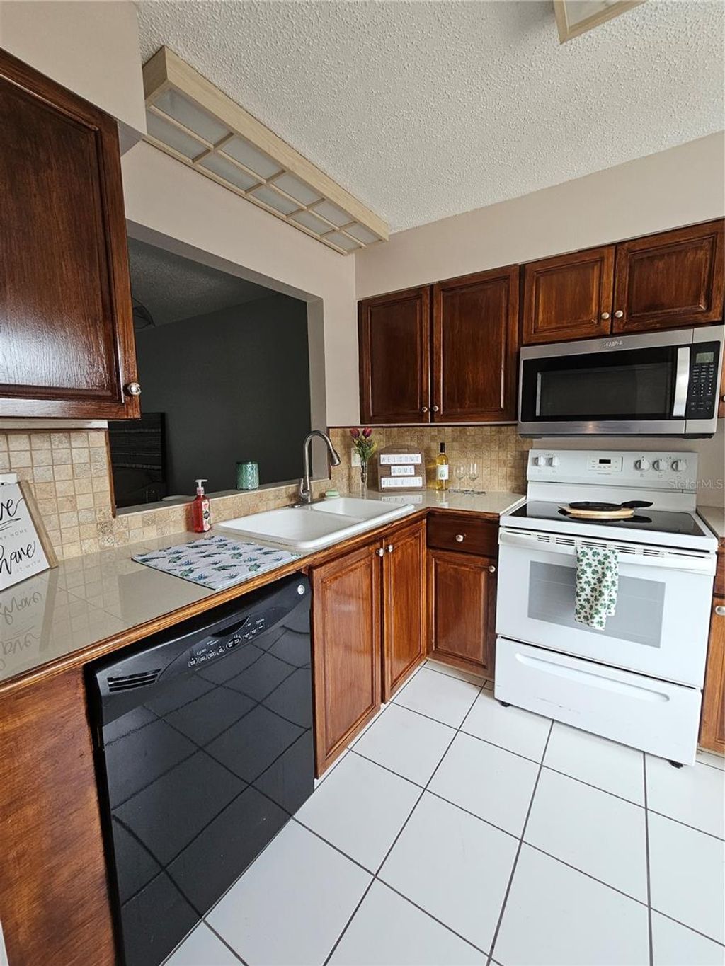 Photo of 13813 Mission Oaks Boulevard, Seminole, FL 33776 (MLS # TB8372105)