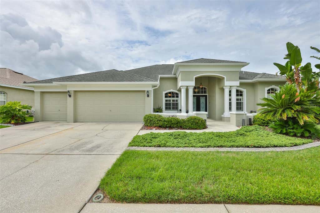 Photo of 7521 Melogold Circle, Land O Lakes, FL 34637 (MLS # TB8515480)