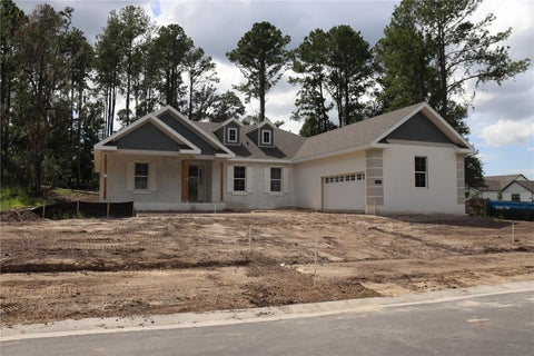 Photo of 5063 Elm Leaf Drive, Brooksville, FL 34601 (MLS # W7888416)