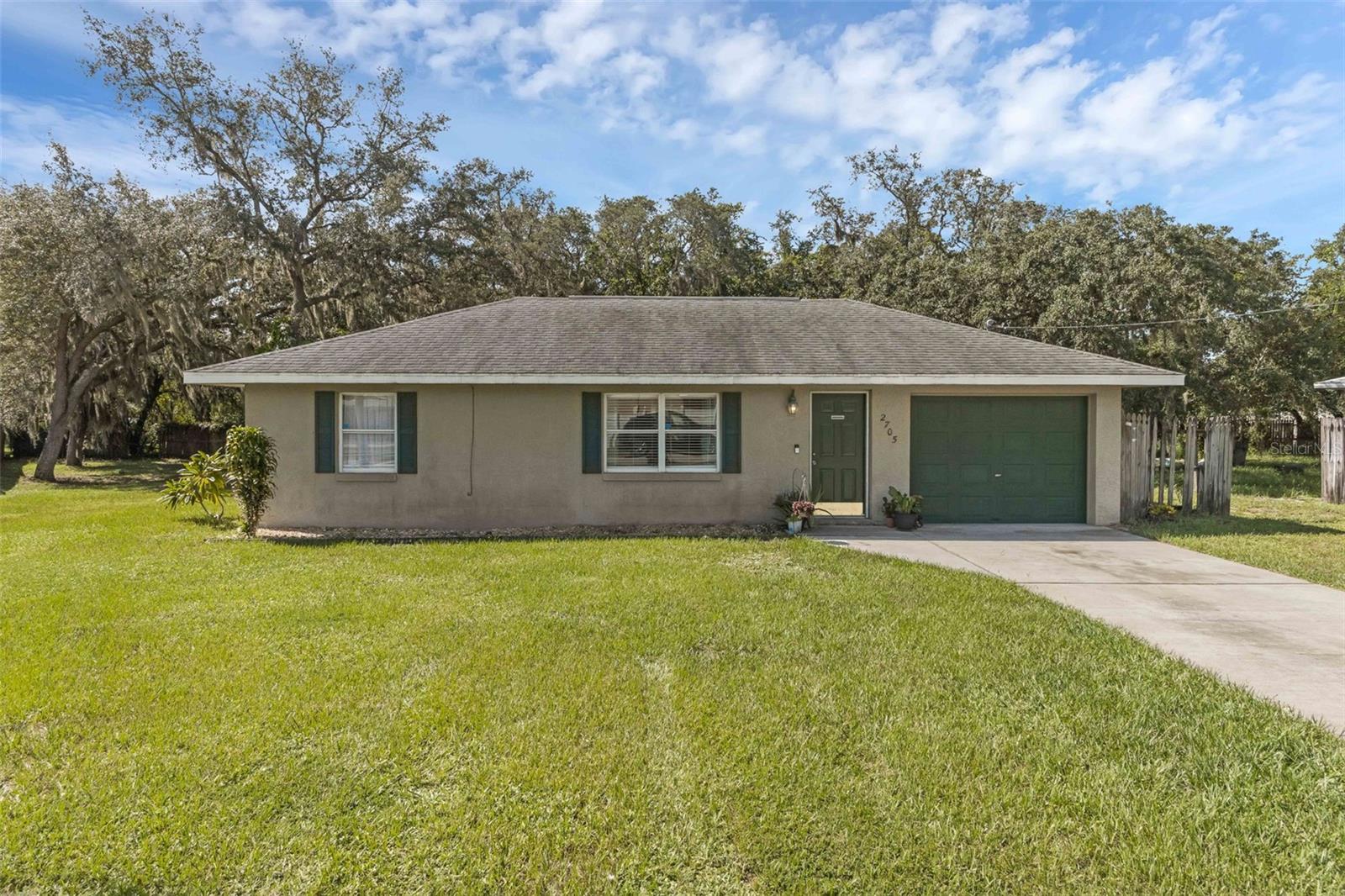This charming 2-bedroom, 1-bath single-family home sits on a spacious 0.28-acre lot with plenty of room to garden, play, or expand. The one car garage has been converted into a finished bedroom, giving you extra living space and flexibility. With no HOA, you’ll enjoy the freedom to truly make this property your own. Conveniently located near shopping, dining, and local lakes, this home offers both comfort and opportunity. Buyer and Buyer’s Agent to verify all information, including room sizes and square footage.