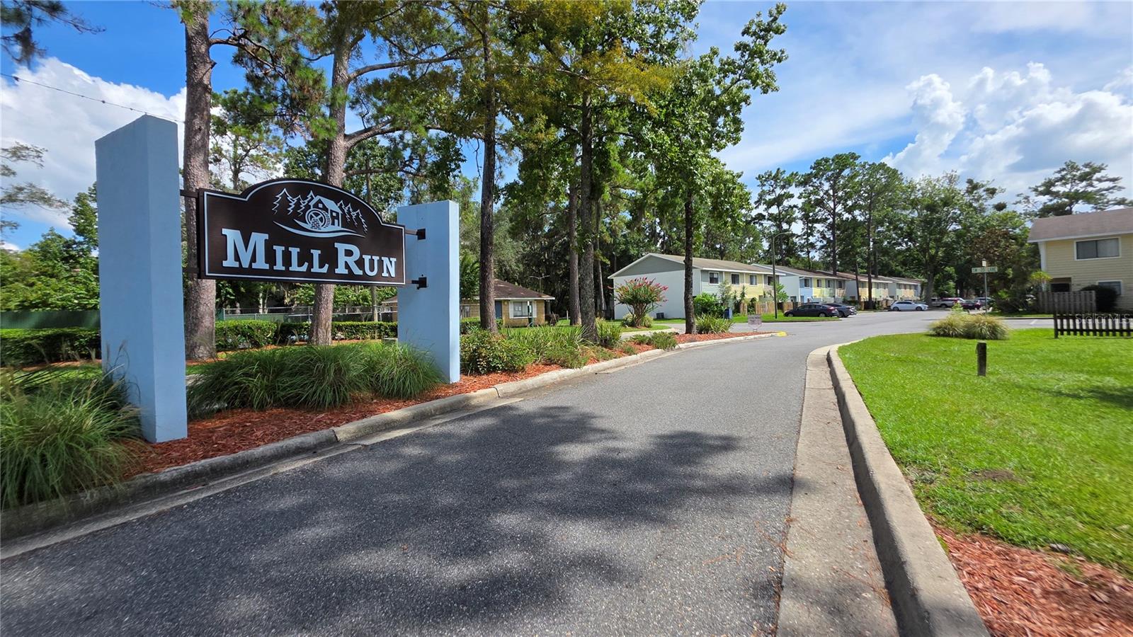 Corner unit townhouse, with ceramic floor downstairs and laminated wood flooring on stairs and second floor. Updated dishwasher, range, built-in microwave and refrigerator. Utility room with washer and dryer hookups. Fenced backyard. Easy access to UF, Butler Plaza, and The Oaks Mall. Mill Run is an attached single-family, not a condo.