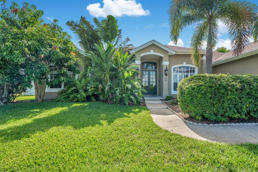 Welcome home to the beautiful Marble Head community! This stunning home offers privacy with no rear neighbors and sits on an oversized lot with lush landscaping and a spacious backyard. Featuring a desirable split floor plan, this 4-bedroom, 3-bath home boasts generous living spaces throughout. The formal dining room can easily be used as a home office or flex space, while a second dining area off the kitchen offers lovely views of the screened lanai. The kitchen is a chef’s dream with granite countertops, a large center island, stainless steel appliances, and an open view into the family room and pool patio. The family room includes a cozy fireplace, custom window treatments, and sliding glass doors that lead out to your private screened-in pool and fully fenced backyard—perfect for entertaining or relaxing. The spacious primary suite includes two custom walk-in closets by California Closets, direct access to the pool area, and a large en-suite bathroom with dual sinks, a walk-in shower, and a garden tub. After a long day, unwind in your sparkling pool—perfect for cooling off in the Florida heat! This home has been lovingly maintained with many upgrades and is truly move-in ready. Don’t miss your chance to live in one of the area’s most sought-after neighborhoods. Conveniently located near major highways, top attractions, shopping, and dining. Schedule your showing today!
https://www.zillow.com/view-imx/79054099-9a89-4566-802d-6e1d32253d7c?setAttribution=mls&wl=true&initialViewType=pano&utm_source=dashboard