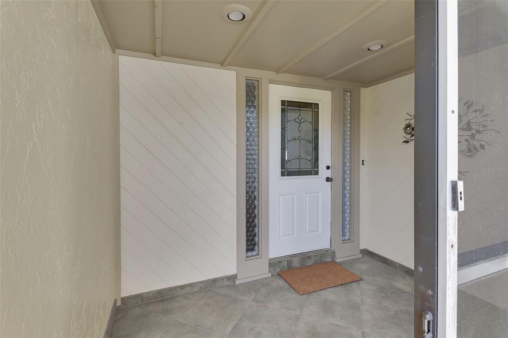 Photo of 116 Oakmont Lane, New Smyrna Beach, FL 32168 (MLS # V4946233)