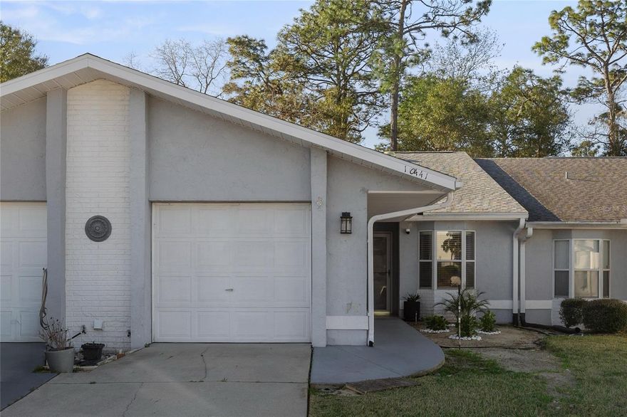 QUICK HIGHLIGHTS:
• Newly renovated villa in desirable all ages gated community with private forest view (no rear neighbors)
• Split-bedroom floor plan ideal for privacy or shared living
• Brand-new washer & dryer included
• Smart lock entry system for modern keyless access
• Includes community pool access, lawn care, cable TV package, trash pickup, and exterior paint maintenance
• Extremely convenient location near Highway 200 and close to I-75
• Pet-friendly rental (subject to approval with $250 pet fee)
• High-speed internet service available

RARE bright renovated villa in the gated Oak Trace Villas community backing up to peaceful wooded views with no rear neighbors — a true hidden gem in desirable SW Ocala. This 2-bedroom, 2-bath home with a 1-car garage includes a brand-new washer and dryer and a smart lock entry system for secure keyless access, along with maintenance services including lawn care, cable TV package, and trash pickup, and access to the community pool. Conveniently located just minutes from Highway 200, I-75, shopping, restaurants, and medical facilities, this home offers both comfort and accessibility.

Step inside to discover an extremely bright and inviting open layout with vaulted ceilings enhanced by solar tubes, filling the home with natural light. The interior features easy-to-maintain LVP flooring and tile throughout -- absolutely no carpet.

The comfortable living and dining areas flow seamlessly into a functional kitchen featuring a breakfast bar, ample cabinet storage, and plenty of space for everyday living or entertaining.

The ideal split-bedroom floor plan offers excellent privacy and flexibility, making it perfect for roommates, guests, or a home office setup. Both bedrooms feature spacious walk-in closets, and the primary suite includes a private en-suite bathroom, while the guest bedroom enjoys direct access to the second full bathroom.

Step outside to the enclosed Florida room with ceiling fan and lighting, a perfect place for morning coffee, relaxing evenings, or enjoying Florida’s beautiful weather year-round. The home also offers excellent privacy with no rear neighbors, backing up to a peaceful wooded view of trees and natural greenery.

The 1-car garage provides convenient parking along with plenty of additional storage space, and high-speed internet service is available, making the home ideal for remote work, streaming, and modern connected living.

Residents enjoy a low-maintenance lifestyle with HOA services including lawn care, trash pickup, and a basic cable TV package, along with access to the community pool. Oak Trace Villas is ideally located just minutes from Highway 200, I-75, shopping, restaurants, medical facilities, parks, and outdoor recreation including nearby state parks and nature trails.