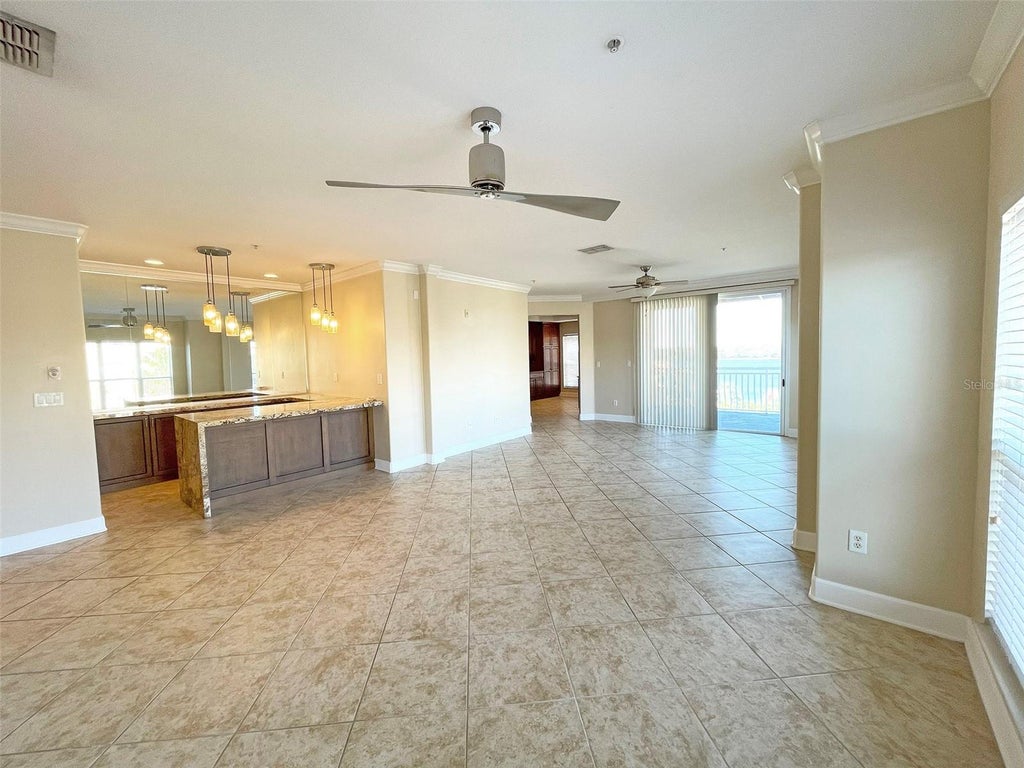 Photo of 7580 Toscana Boulevard #834, Orlando, FL 32819 (MLS # O6421273)