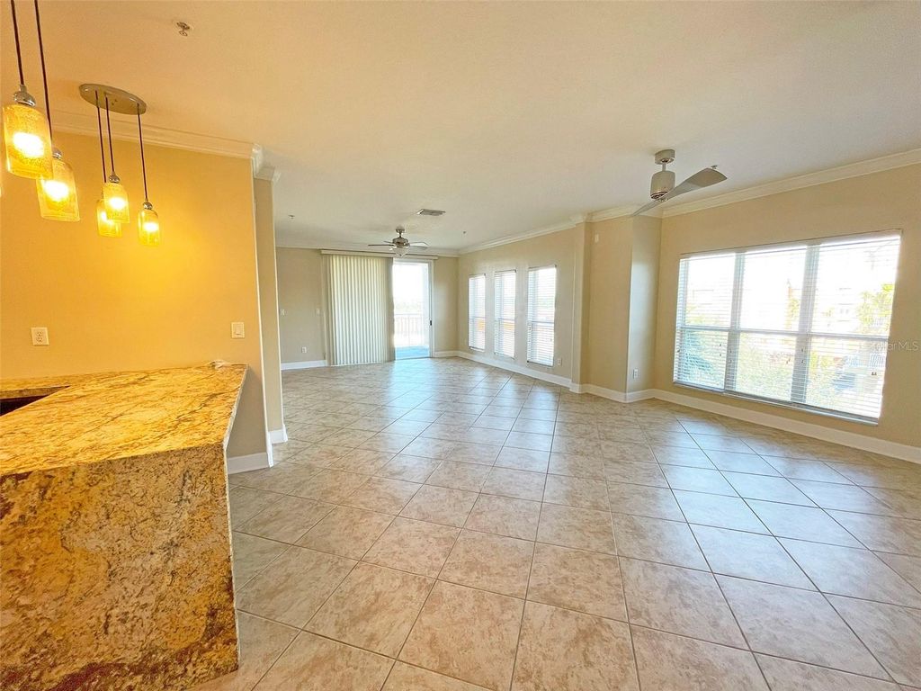 Photo of 7580 Toscana Boulevard #834, Orlando, FL 32819 (MLS # O6421273)
