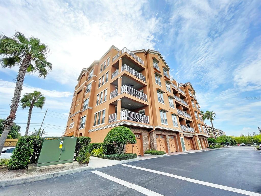 Photo of 7580 Toscana Boulevard #834, Orlando, FL 32819 (MLS # O6421273)