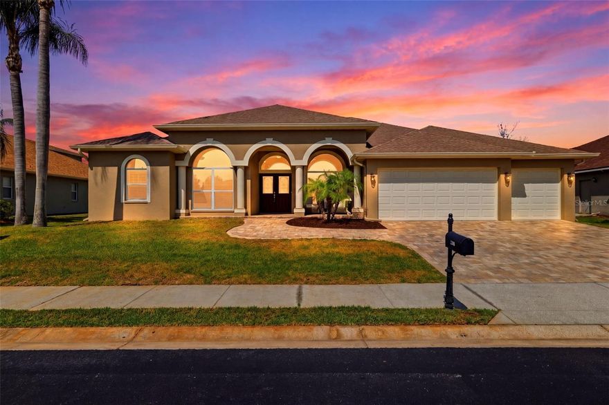 Situated on a private cul-de-sac, this beautifully upgraded 4 bedroom, 3 bath home with office and bonus room offers nearly 3,000 sq ft and a newer roof (2018). A paver drive and columned porch lead to a double door entry, opening to elegant living and dining spaces with tray ceilings and crown molding. The gourmet kitchen features granite countertops, stainless appliances, gas convection oven, and a center island overlooking the family room. Enjoy a screened lanai with covered patio and heated pool, perfect for entertaining. The first-floor primary suite offers dual custom walk-in closets and a spa-style bath with soaking tub and separate shower. Thoughtful split plan includes a private guest wing with pool bath, plus an upstairs bonus room with built-ins. Low HOA, no CDD, and no flood insurance required. Conveniently located near top-rated schools, shopping, dining, and Tampa.