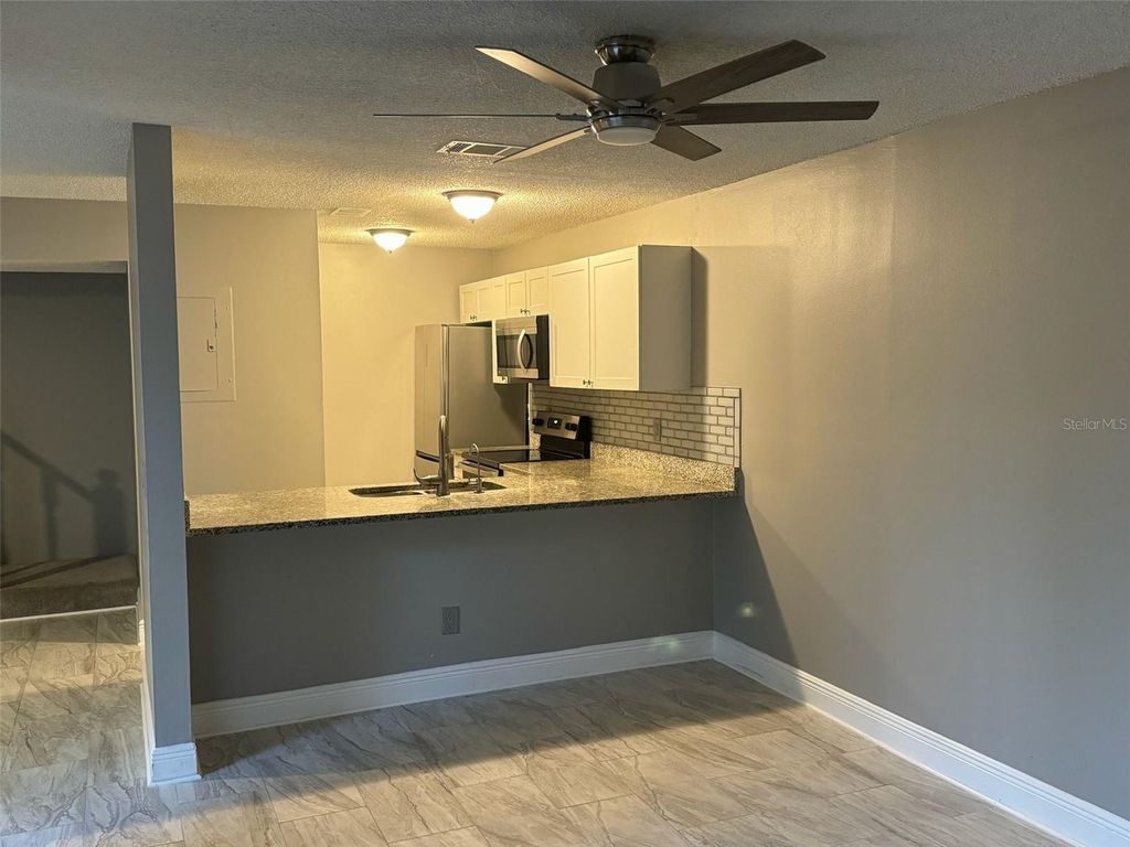 Photo of 1030 Abada Court NE #110, Palm Bay, FL 32905 (MLS # S5143122)