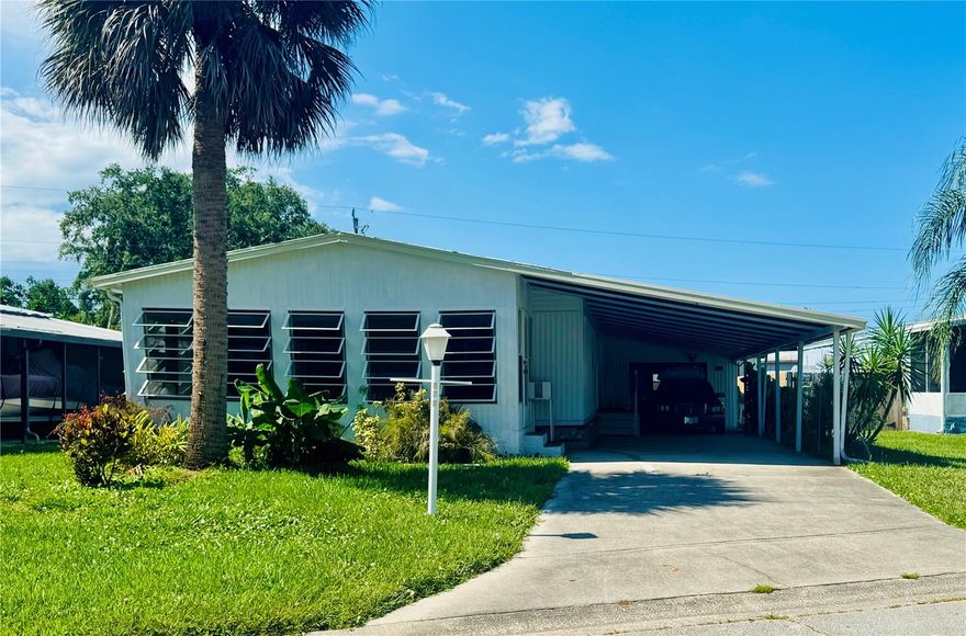 Welcome to this well-maintained home located in a quiet neighborhood in Edgewater, Florida. This 2-bedroom, 2-bathroom property offers a comfortable and functional layout with spacious living and dining areas. The highlight of the home is the large screened-in room—perfect for relaxing, entertaining, or enjoying Florida’s beautiful weather bug-free year-round. The kitchen features ample cabinet space and flows seamlessly into the main living areas. Both bedrooms are generously sized, and the primary suite includes an en-suite bath for added privacy. Outside, enjoy a nicely sized yard with plenty of room for gardening or outdoor activities. Located in the tranquil community of Terra Mar Village, residents enjoy exceptional amenities and a strong sense of community. The neighborhood offers two 40,000-gallon saline swimming pools, one of which is heated year-round, and a private 300-foot fishing pier along the scenic Florida Intracoastal Waterway. Outdoor enthusiasts will appreciate the shuffleboard, bocce ball, and horseshoe courts, while the large brick clubhouse with an outdoor pizza oven is perfect for social gatherings and community events held throughout the year. Boating enthusiasts will love the newly constructed secure marina with covered boat lifts and slips, offering easy access to the Intracoastal Waterway (slip leases are currently available). A convenient community boat launch makes it easy to start your water adventures. Additionally, affordable on-site RV and trailer storage is available for a minimal monthly fee. Terra Mar Village provides a perfect balance of recreation, relaxation, and community, making it ideal for families or anyone seeking a peaceful yet active lifestyle.