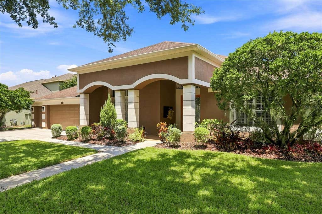 Photo of 8310 Summer Grove Road, Tampa, FL 33647 (MLS # TB8539445)