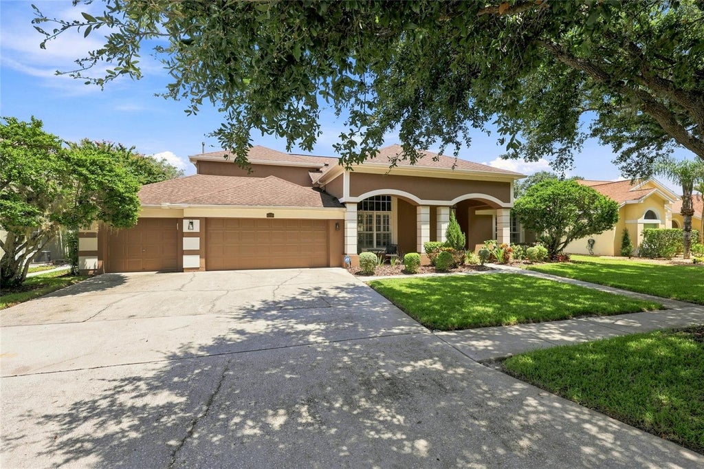 Photo of 8310 Summer Grove Road, Tampa, FL 33647 (MLS # TB8539445)