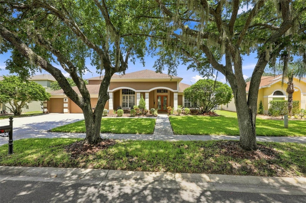 Photo of 8310 Summer Grove Road, Tampa, FL 33647 (MLS # TB8539445)