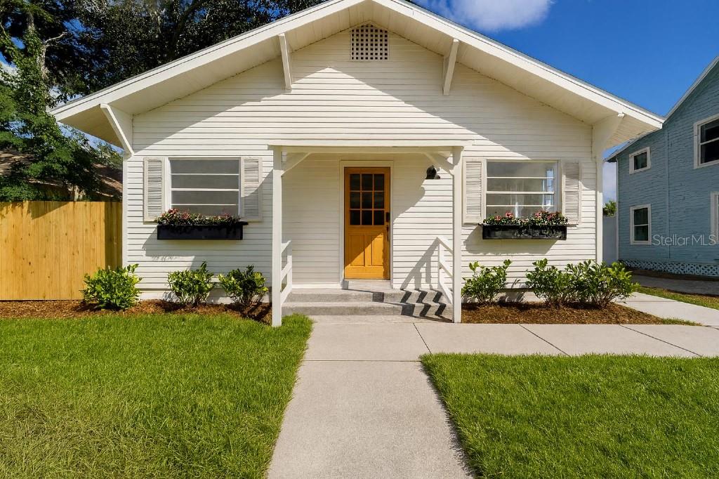 Located on a desirable street with sidewalks—just 4 min to Downtown Clearwater & 8 min to award-winning Clearwater Beach! Beautifully updated 5BR/2BA home in prime location. Move-in ready with new interior & exterior paint, brand-new roof, updated baths, new water heater, and a remodeled kitchen w/ new stainless appliances & butcher block countertops. Bright, open kitchen/dining/living layout with extra-tall ceilings, historic charm, and all new modern fixtures. This coastal farmhouse exudes warmth and style with designer touches throughout. Spacious, fully fenced backyard with new sod and landscaping—room for a play set, shed, ADU or all three! Whether you're a first-time buyer or looking for a turn-key home for yourself or as a short-term rental, this is the one! 4-point inspection available for buyer peace of mind! Some photos partially virtually staged.