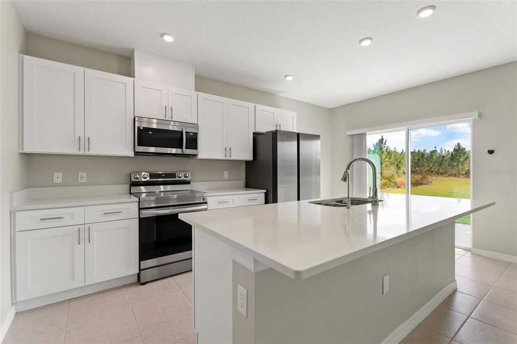 Photo of 4201 Calliandra Drive, Indian Lake Estates, FL 33855 (MLS # P4938125)