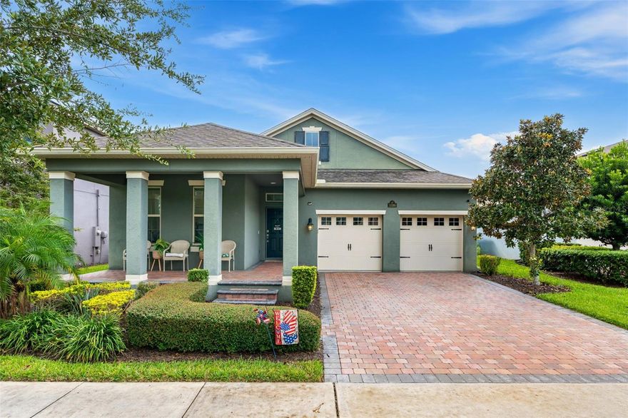 Experience the best of resort-style living in the desirable Waterleigh community of Winter Garden. This beautifully designed home blends modern elegance with everyday comfort, offering thoughtfully curated details like crown molding, tray ceilings, and an open-concept layout that’s perfect for both relaxation and entertaining.

At the heart of the home, the spacious kitchen features stainless steel appliances, abundant cabinetry, and a large center island that flows effortlessly into the living and dining areas—ideal for hosting gatherings or enjoying quiet family dinners. The primary suite is a true retreat with a walk-in closet, dual vanities, and a luxurious en-suite bath. Three additional bedrooms provide ample space for guests, a home office, or a growing family.

Step outside to the screened lanai and take in serene views of the surrounding landscape, or unwind on the covered front porch as the neighborhood comes alive with friendly faces and golf carts passing by.

Waterleigh’s resort-style amenities elevate your lifestyle with multiple pools, clubhouses, fitness centers, playgrounds, sports courts, dog parks, and scenic walking paths around sparkling lakes. Perfectly situated just minutes from Disney, top-rated schools, and the vibrant shops and dining of Hamlin, this home offers both convenience and community in one of Winter Garden’s most sought-after neighborhoods.