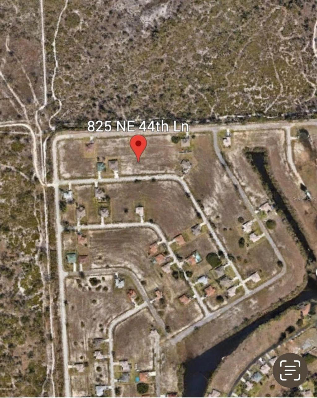 Photo of 825 NE 44th Lane, Cape Coral, FL 33909 (MLS # FC309982)