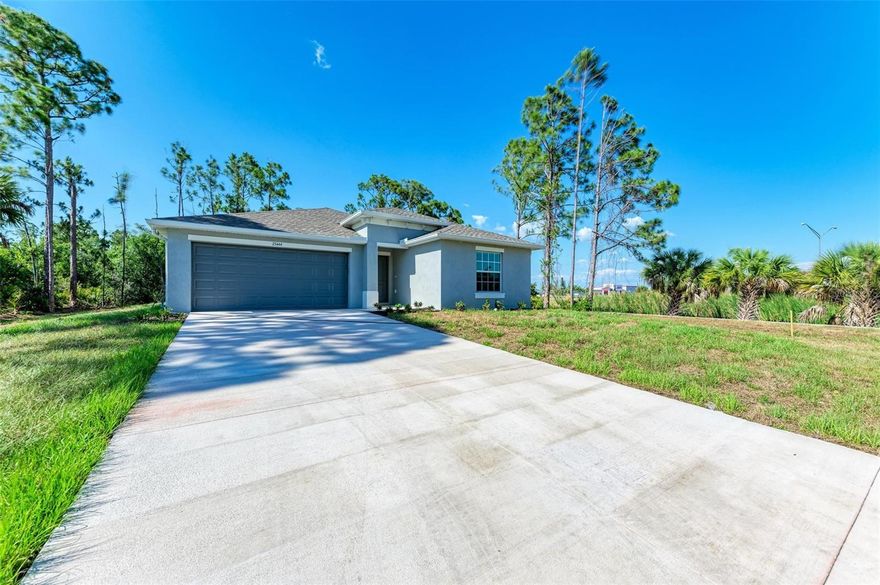 Discover this newer 4-bedroom, 2-bath home in the growing community of Port Charlotte. Designed with a desirable split-bedroom floor plan, this home offers both privacy and functionality with plenty of space for everyday living. The spacious kitchen features a large island with seating, pantry storage, and a dedicated dining area. The bright and open family room is filled with natural light from oversized windows, creating a welcoming space for relaxing or entertaining guests. The primary suite includes dual vanities, a tub/shower combination, and generous walk-in closets. Three additional bedrooms share a second full bathroom, providing flexibility for family, guests, or a home office. Additional features include a rear patio and a 2-car garage. Conveniently located near shopping, dining, parks, and Gulf Coast beaches.  Section 8 applicants are welcome to apply. Schedule your private showing today!