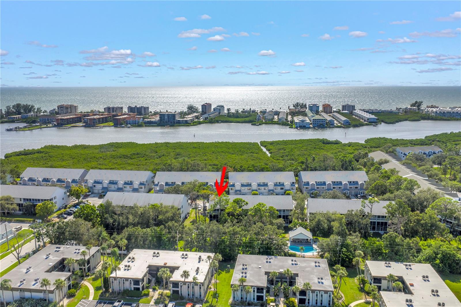 **Welcome to Your Tranquil Seminole Retreat!**
This beautifully updated 3-story townhome backs to a serene, wooded conservation area, offering peaceful views and privacy rarely found in this prime location. Designed for indoor-outdoor living, this home features **screened-in patios on all three floors**—each perfectly positioned to enjoy the quiet backdrop of nature. A **custom Trex deck patio**, unique to this unit, provides the ideal spot for grilling and entertaining in your private backyard setting.
Inside, the bright and airy **open floor plan** is complemented by a 2022 **new kitchen** with quartz countertops, stylish cabinetry, and updated appliances. The **primary bedroom boasts vaulted ceilings** and its own private screened balcony, while the first-floor **bonus room with a full bath and wet bar** offers exceptional flexibility—perfect for a 4th bedroom, home office, den, or even a private in-law suite with its own entrance and patio.
Peace of mind comes with numerous updates, including **new A/C (2022)**, **updated plumbing (2019)**, and **new kitchen appliances (2022)**. This property also weathered the 2024 hurricanes with **no flooding or damage**.
The community backs to both a conservation area and the Intracoastal Waterway, offering amenities like a sparkling pool and easy access to nearby walking trails. Enjoy the best of Florida living—minutes to the beach, the Pinellas Trail, and Walsingham Park, plus quick access to dining, arts, and entertainment in St. Petersburg and Tampa.
This move-in-ready home blends coastal charm with modern upgrades and a one-of-a-kind outdoor living experience. Don’t miss your chance to own this Seminole gem!