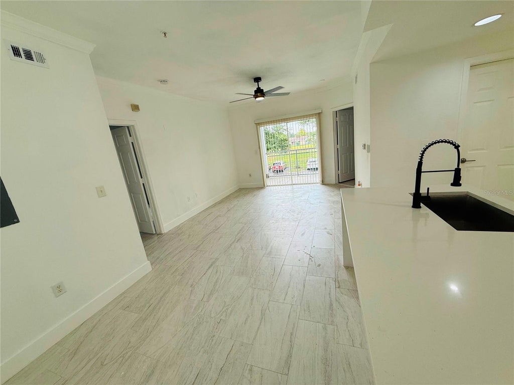 Photo of 3712 Castle Pines Lane #4122, Orlando, FL 32839 (MLS # O6444585)
