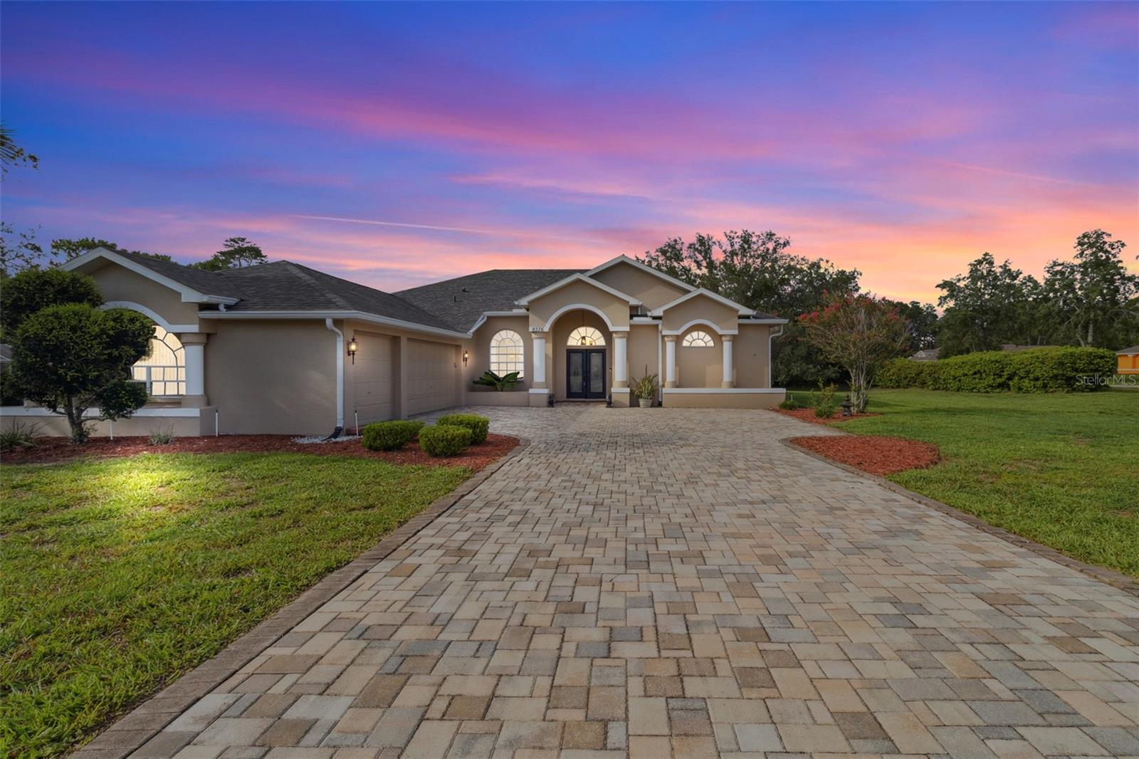 Sellers generously offering a concession towards buyers closing costs! Welcome to 9376 Bearwalk Path, an exceptional pool home nestled in the highly desirable Woodland Waters community of Weeki Wachee. Set on a beautifully landscaped 1.23-acre corner lot, this three-bedroom, three-bathroom residence offers a rare blend of privacy, elegance, and updated comfort—all within one of Hernando County’s most scenic neighborhoods. Woodland Waters is known for its rolling hills, oversized parcels, and tranquil, nature-inspired setting, providing residents with a peaceful retreat while still being close to everyday conveniences and the Suncoast Parkway.
This thoughtfully designed home features a spacious split floor plan with updated luxury vinyl plank flooring flowing seamlessly throughout. The open-concept kitchen overlooks the living room, creating an inviting space perfect for entertaining or gathering with loved ones. Natural light pours in from large windows and glass sliders, highlighting fresh 2024 interior and exterior paint and offering serene views of the sparkling pool and surrounding greenery.
The primary suite is a true retreat, complete with a large walk-in closet, pool views, and a luxurious bathroom featuring a soaking tub, dual vanities, and a separate shower. Step outside to the extended lanai and unwind in your private backyard oasis—enhanced by a newly pavered driveway and pool deck, ideal for outdoor relaxation and Florida-style entertaining. The lush lot also features mature landscaping that includes a fig tree and two loquat trees, adding to the charm, shade, and seasonal fruit you can enjoy right from your own backyard.
This home has been meticulously maintained and thoughtfully upgraded with a brand-new 2025 roof, a 2017 HVAC system, and a 2023 replacement of the drain field—ensuring peace of mind for years to come. Combining modern updates with timeless design, 9376 Bearwalk Path delivers the best of Woodland Waters living, where space, style, and nature converge in perfect harmony.