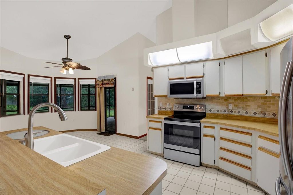 Photo of 642 Erin Way, Brooksville, FL 34601 (MLS # W7882901)