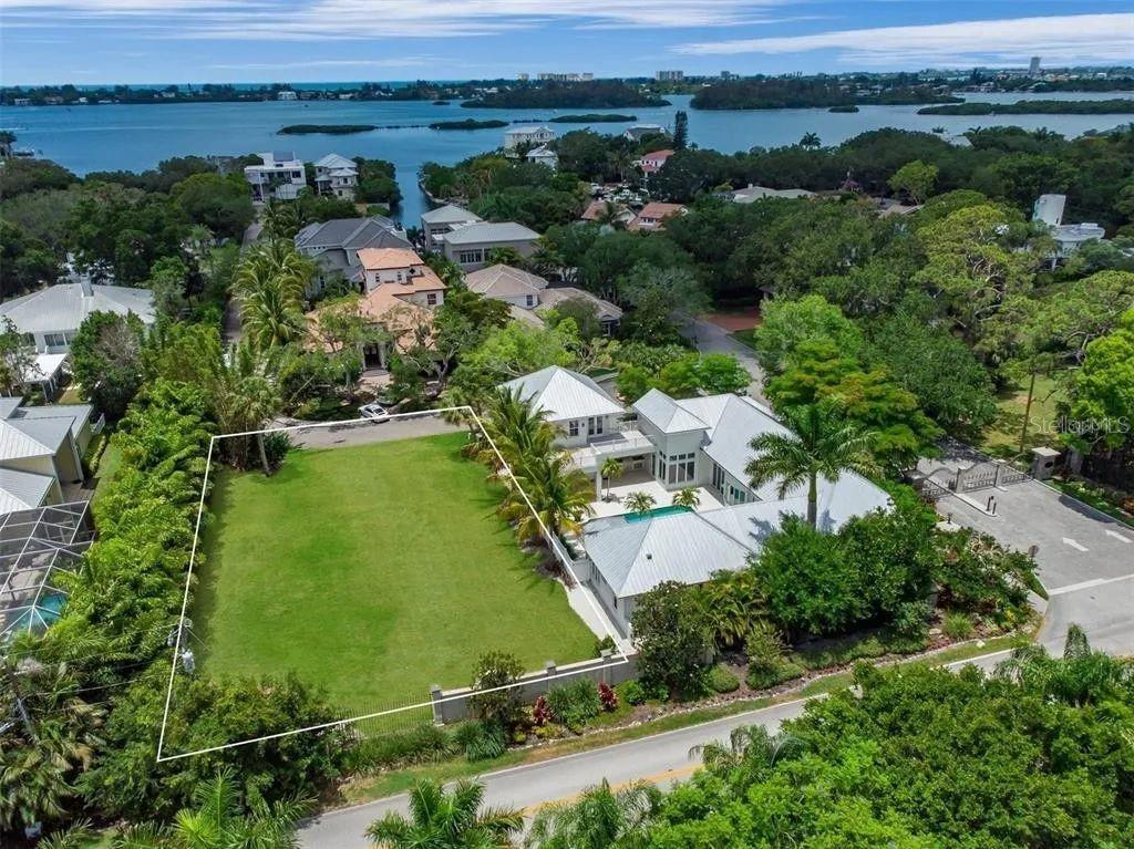 Create your custom masterpiece on one of Sarasota’s most coveted homesites within the prestigious, gated enclave of Oyster Bay Landings. With only 14 exclusive residences, this intimate waterfront community offers both privacy and prestige, making it the perfect setting for a discerning buyer.
This expansive 13,000+ sq. ft. lot comes complete with a deeded dock slip, equipped with power and water, providing effortless access to the Intracoastal Waterway and just minutes to the sparkling Gulf of Mexico. Imagine spending your mornings on the water and your evenings entertaining in a custom-designed residence tailored perfectly to your lifestyle.
The location is nothing short of extraordinary—just five minutes to Siesta Key Beach, consistently ranked among the world’s best, and less than ten minutes to downtown Sarasota, where you’ll find fine dining, arts, culture, and entertainment. A short stroll takes you to Morton’s Market, the Field Club, Publix, and Sarasota Memorial Hospital, ensuring everyday convenience. Families will also appreciate access to highly regarded local and magnet schools.
This is more than a homesite—it’s an opportunity to create a lifestyle defined by elegance, coastal beauty, and unmatched convenience. Rarely does a property of this caliber come available in such a highly sought-after community. Don’t miss your chance to build your dream home in Oyster Bay Landings.