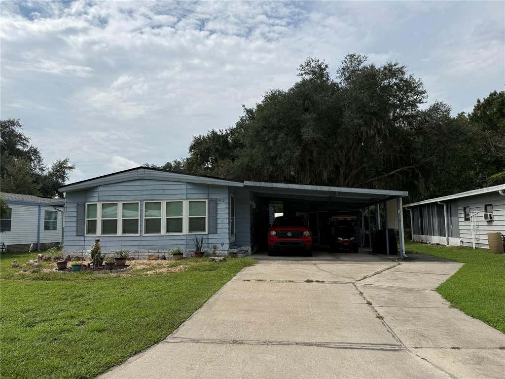 Photo of 802 Robin Lane, Wildwood, FL 34785 (MLS # G5115879)