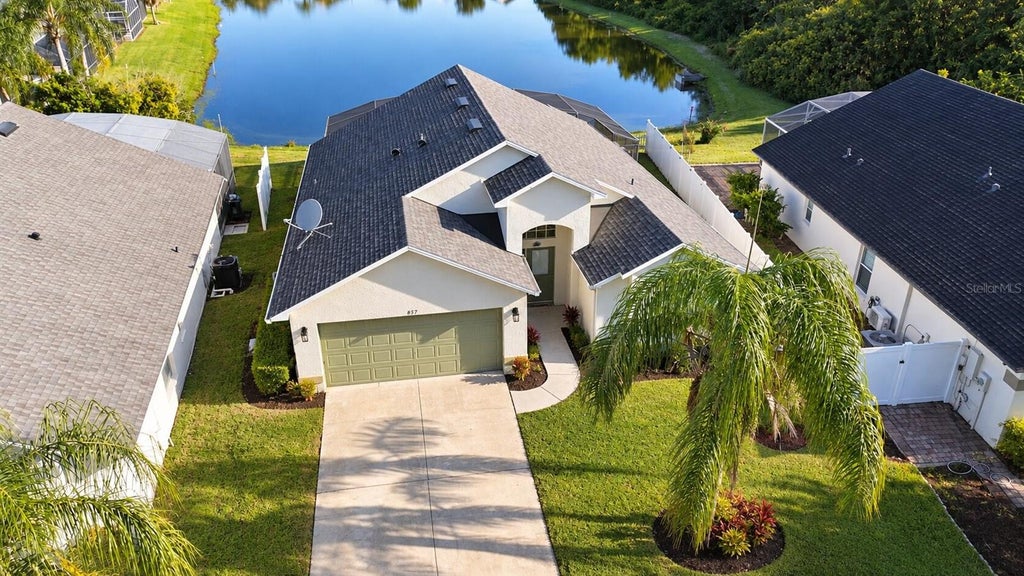 Photo of 557 Eagle Pointe S, Kissimmee, FL 34746 (MLS # O6449802)