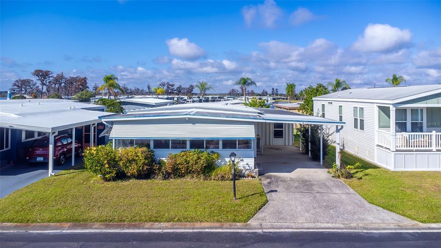 Low, Low, HOA! There is NO LOT RENT!
Discover affordable lakefront living in Clermont, Florida in the highly sought-after Emerald Lakes Co-Op 55+ community on the Clermont Chain of Lakes. This beautifully maintained mobile home for sale in a 55+ community offers comfort, space, and exceptional value in one of Central Florida’s most desirable retirement locations.
The spacious living room and Florida room provide a warm, open layout ideal for entertaining or relaxing. The primary bedroom with walk-in closet, oversized linen storage, and private en-suite bathroom create a comfortable owner’s retreat.
An additional enclosed Florida room/porch offers the perfect place to enjoy morning coffee, family lunches, or peaceful afternoons reading. The home also features a storage room with washer and dryer plus a functional workshop area for hobbies and projects. Rare Ownership Share Included
This unique ownership share significantly reduces monthly HOA and maintenance fees while covering lawn care, cable, Wi-Fi, water, sewer, and community amenities — making this one of the most affordable lakefront retirement homes in Clermont.

Emerald Lakes Community Amenities:
Lakefront dock with boat slips for rent
Private boat ramp to the Clermont Chain of Lakes
Resort-style pool
Clubhouse and library
Shuffleboard and pool table
Quiet, well-maintained 55+ retirement community with only 211 homes
Located minutes from downtown Clermont Florida, you’ll enjoy lakefront dining, bike trails, shopping, entertainment, and waterfront parks — all while living in a peaceful lakefront retirement setting.
This is a rare opportunity to own a lakefront mobile home in Clermont’s Emerald Lakes 55+ community with ownership share benefits and low monthly fees.
Schedule your private tour today and start living the Central Florida lake lifestyle you’ve been dreaming of!