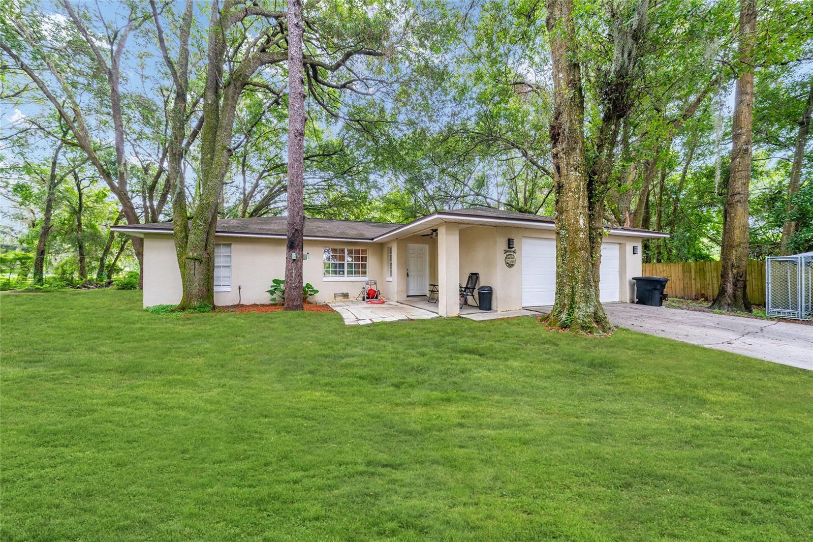 Don't Miss Out on This Incredible Opportunity!
Discover this hidden gem situated on a beautiful 1.5-acre lot in the heart of Wildwood—just minutes from the brand-new Target, a variety of dining options, I-75, and The Villages’ Brownwood Town Square.
This charming 3-bedroom, 2-bath home with a 2-car garage offers plenty of space, privacy, and potential. The home is move-in ready with new stainless steel appliances, a new hot water tank, new drain field, and an AC system replaced in 2011. Roof updates were completed in 2014, and there’s even a drywall finished outdoor shed for extra storage or a workspace.
While it could benefit from some modern updates, that’s exactly why it’s priced to sell—offering savvy buyers a rare chance to build instant equity in an unbeatable location.
Homes like this—with acreage, privacy, and convenience—are hard to find at this price. Act fast before it’s gone!