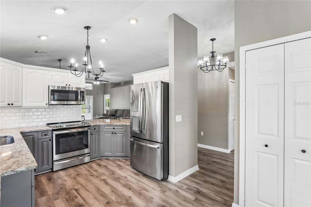Photo of 14443 Middle Fairway Drive, Spring Hill, FL 34609 (MLS # W7886765)