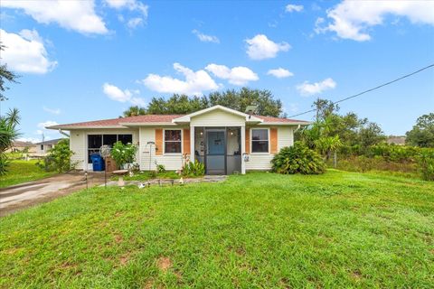 Photo of 2802 73rd Street W, Lehigh Acres, FL 33971 (MLS # TB8448191)