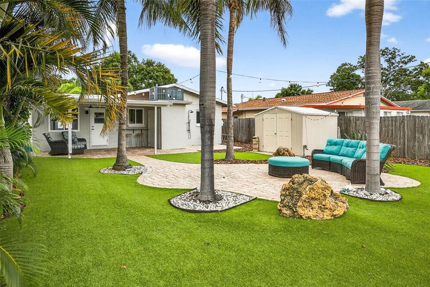 Tropical Getaway in St. Pete! 30 day minimum + Turnkey Furnished + All Utilities Included + Sleeps 4 + Pet Friendly + Extra Cars, Boat, or  RV Parking! Welcome to your own slice of paradise! Whether you’re planning a vacation, or an extended work trip this charming St. Pete retreat has everything you need for a comfortable and memorable stay. Boating, Jet Skis, Golfing, Biking, Beaches, Sightseeing, and nightlife all await just minutes away. OR Stay here and enjoy the peace and beauty of a one-of-a-kind back yard oasis. This beautifully updated home is the perfect St. Petersburg escape, tucked away in a quiet neighborhood yet only 4 miles from vibrant Downtown St Pete and a short drive to the world-famous Gulf beaches or Tampa’s beautiful downtown Riverwalk.    Highlights we think you’ll love: *Comfortably sleeps up to 4 guests  *Pet friendly fenced yard – bring your furry friends along!  *Plenty of parking, with space for multiple cars, boat or RV.  *Freshly updated kitchen & bathroom with stylish finishes and luxury vinyl floors throughout.  *Walkable access to restaurants and bars.  *Easy access to the off-street bike path and just 4 mile ride to the Downtown St Pete bayside views & parks.  *Public Golf course barely 1 mile away, and so much more!   Step into your private backyard designed for relaxation and fun. With private tropical landscaping, fencing, with park-like lush turf & brick pavers, this is the ultimate spot to kick back. Lounge under the shady palms, Grill, play cornhole, or enjoy cocktails on the patio for memorable evenings.  The bedrooms are designed with comfort in mind, offering plush bedding and calming décor. Modern amenities included like a washer/dryer, high-speed WiFi, and central A/C ensure a stress-free stay. Your Florida stay awaits!