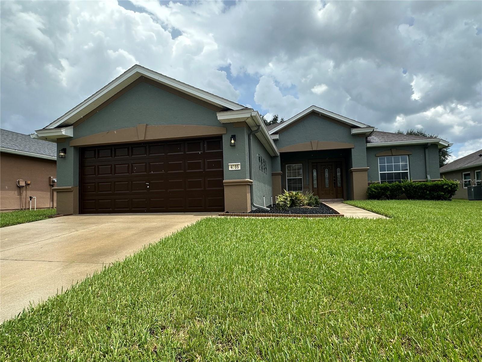 BEAUTIFULLY UPDATED PROPERTY IN ACTIVE SW OCALA COMMUNITY! 4-bedroom, 2-bathroom, 2-garage home in the Saddle Creek neighborhood of Fore Ranch boasts 2185 sf living area. Stunning front door entry leads to the great room w/living & dining areas, spacious family room with triple sliders to enclosed Florida room opens to an eat-in kitchen, primary suite w/tile floors & tiled bath w/dual sink vanity, separate shower & soak tub & BIG walk-in closet, inside laundry, enclosed Florida room w/sliding acrylic windows overlooking the privacy hedged backyard, double garage w/auto opener. Community features clubhouse, fitness center, pool, basketball courts & dedicated walking trails.. Minutes to shopping, dining & hospital via the Hwy 200 corridor.