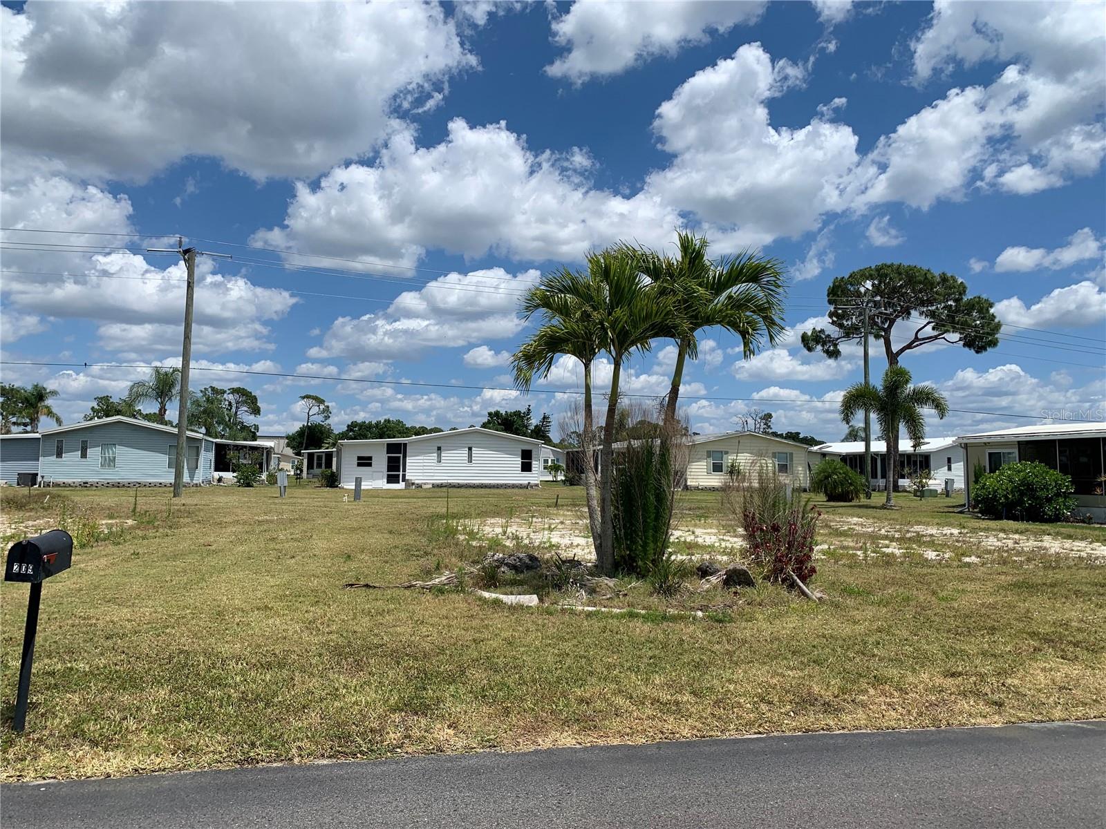 Vacant Lot located near front of Community. Very Nice location also close to Club House and Amenities. La Casa is a quiet senior community, just for persons 55 and up, located in North Port, Florida in Sarasota County. There are 974 homes nestled among a variety of native trees with spacious common grounds surrounding our eight lakes. Our lots average a generous 60' by 80'. The ultimate lifestyle on Florida’s Gulf Coast is located between Sarasota and Fort Myers with boat access to the Gulf of Mexico. La Casa is an impeccably maintained isolated and self-contained oasis. It is convenient for shopping, sightseeing, golfing, fishing and boating, as well as all the culture and elegance the Southwest Florida area is noted for. Residents and visitors enjoy the warmth of Southwest Florida winters in a relaxed and unhurried environment far removed from the hustle of Florida’s east coast. You’ll be surrounded by hundreds of palms reaching for the sky and beautiful mature lush landscaping which demonstrates the utmost level of care our property receives from residents and management
La Casa may have the best pools in the area. An extremely large, 40 X 60-foot swimming pool is our crown jewel and is kept at a perfect 87 degrees. Our smaller 20 x 40 pool is quietly nestled between the clubhouse and the Activity Building. Both pools have adjacent hot tubs which are perfect for soaking muscles that are tired from golfing or tennis. Wireless Internet (WiFi) is available at the Clubhouse, Activity Building and Recreation Hall area where these pools & spas are located, so you can catch some rays while you catch up on your email! Sound enticing?
La Casa is a friendly, family community. You will be away from the hustle and bustle except when you want to be part of it. When you leave our gates, North Port is only 1.5 miles from the city center, where you will find every kind of retail store and service you could need.
Come for a visit or make La Casa your home!