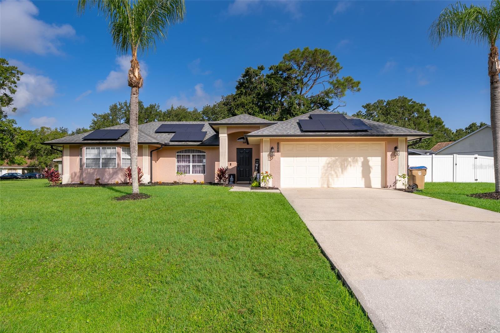 This beautifully updated home offers 5 bedrooms and 2 full bathrooms with durable laminate and tile flooring throughout. The main house features 3 spacious bedrooms, 2 bathrooms, a welcoming living room, dining area, and a cozy family room. Two of the bedrooms features private entrances and can be utilized as in-law suites—perfect for extended family or rental income opportunities.
Enjoy the oversized in-ground pool, complete with a heated system, screen enclosure, and a recently resurfaced finish (3-months old with 2-year warranty). The home is energy-efficient with solar panels keeping electric bills below $50/month.
The kitchen is a chef's dream with stainless steel appliances, granite countertops, and a modern tile backsplash. The oversized primary bedroom includes a luxurious garden tub, tile stand-up shower, and private access to the pool area.
Recent Updates Include:Roof Replaced in 2018, Gutters: Installed in 2024, Interior & Exterior Paint: Completed in 2023,
Water Heater: 2012, A/C Unit: 2015, Septic Tank: Cleaned 1 year ago, and vinyl white fence installed: 2023.
Bonus: Home comes fully furnished, including a bar cabinet and bookshelf.
Don't miss the opportunity to own this move-in ready home with modern finishes, excellent upgrades, and versatile living spaces!