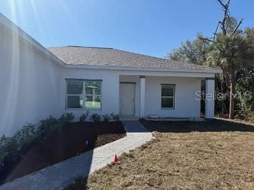 Photo of 383 Arbor Street, Port Charlotte, FL 33953 (MLS # C7516861)