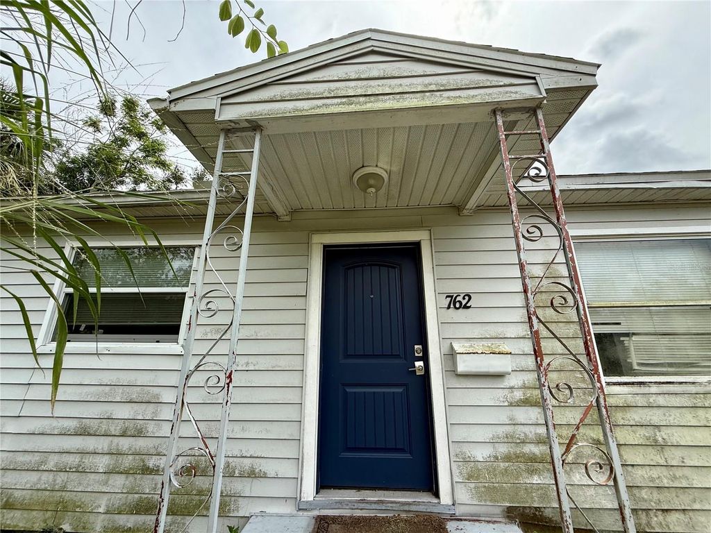 Photo of 762 60th Avenue NE, St Petersburg, FL 33703 (MLS # OM709574)