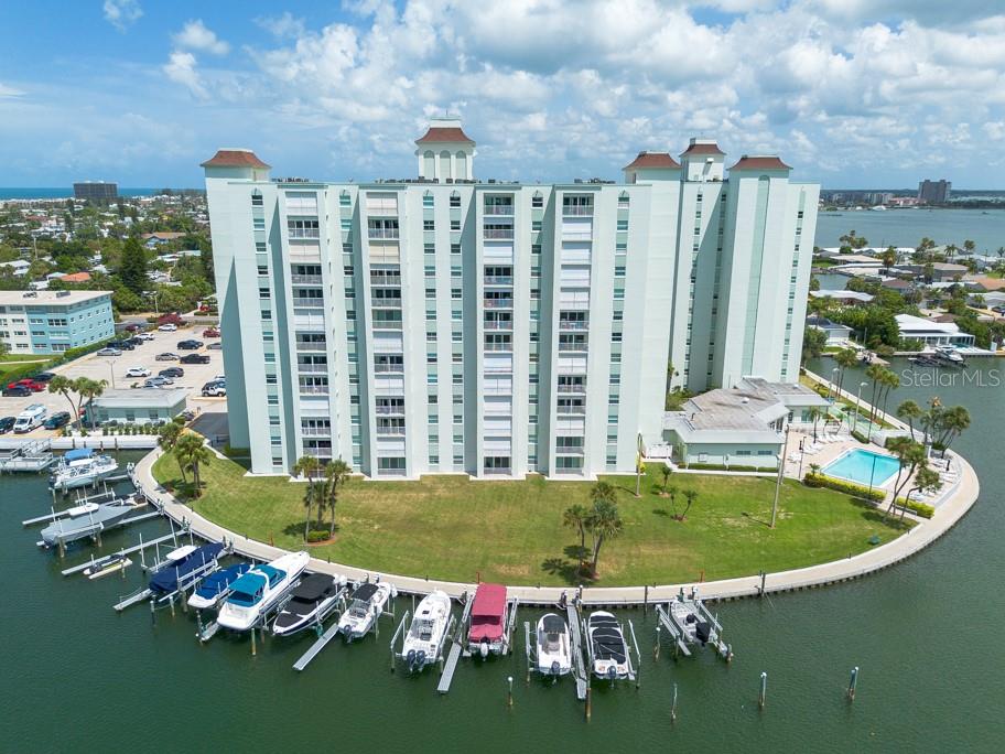 Savor the quintessential coastal lifestyle in the gated community of Three Palms Pointe Condo. This 7th-floor beachside retreat offers a spacious 1-bedroom, 1-bathroom layout with 1,003 square feet of living space. FULLY FURNISHED, including artwork. The unit features tile flooring throughout, except in the closet. Enjoy breathtaking views of the Skyway Bridge from your private balcony, now equipped with BRAND-NEW HURRICANE SHUTTERS. Step into a lifestyle of convenience and leisure. Residents benefit from a range of desirable amenities, including a heated swimming pool, spa, 24-hour security, fitness center, game room with pool tables, fishing dock, boat slips, bike and kayak racks, shuffleboard, and quick beach access. Laundry facilities and private storage are conveniently located at the end of the hallway on every floor. The condo comes with one parking spot, with the option to request additional spaces from the community. Located just three blocks from the pristine white "sugar sand" beaches, this condo places you moments away from vibrant local attractions, water activities, and all the natural beauty the Gulf Coast has to offer. Whether you're seeking a tranquil retreat or an active beachside lifestyle, this condo delivers the best of both worlds. Schedule your viewing now and make this exquisite condo your private sanctuary.