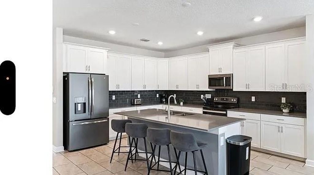 Photo of 830 Sticks Street, Davenport, FL 33896 (MLS # O6400752)